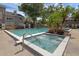 Community pool and spa area, with attractive landscaping and well-maintained exterior buildings at 2206 Stonington Ave # 2206, Orlando, FL 32817