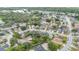 Serene aerial view of a charming neighborhood with tree-lined streets and well-maintained homes at 2216 Grand Tree Ct, Lake Mary, FL 32746