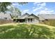 A generously sized backyard featuring a lush lawn and privacy fencing at 2216 Grand Tree Ct, Lake Mary, FL 32746