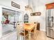 Dining space and stainless steel appliances complement the dining table at 2216 Grand Tree Ct, Lake Mary, FL 32746