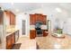 Stylish kitchen with stainless steel appliances, granite countertops, and pantry at 2216 Grand Tree Ct, Lake Mary, FL 32746