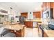 Modern kitchen with stainless steel appliances, granite countertops, and a center island with breakfast bar at 2216 Grand Tree Ct, Lake Mary, FL 32746
