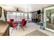 Enclosed patio with a ceiling fan, outdoor furniture, and view of the backyard at 2216 Grand Tree Ct, Lake Mary, FL 32746