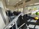 Well-equipped fitness center with modern machines and large windows for an active lifestyle at 2247 Marsh Sedge Ln, Winter Park, FL 32792