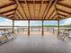Stunning covered gazebo on the lake, perfect for relaxing and enjoying the waterfront views at 2247 Marsh Sedge Ln, Winter Park, FL 32792