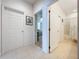 Hallway with neutral walls offering seamless flow to the bedrooms and bathrooms at 2274 Foliage Oak Ter, Oviedo, FL 32766