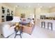 Bright living room boasts neutral walls, comfortable seating, and open floor plan at 2274 Foliage Oak Ter, Oviedo, FL 32766