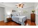 Bedroom with neutral decor, hardwood floors, and natural light from a window at 2312 S Summerlin Ave, Orlando, FL 32806