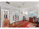Home office with natural light, hardwood floors, and view into hallway at 2312 S Summerlin Ave, Orlando, FL 32806