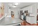 Modern kitchen boasting stainless steel appliances, sleek countertops, and ample cabinet space at 2312 S Summerlin Ave, Orlando, FL 32806