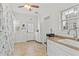 Bright laundry room with a sink, tile floors, and plenty of natural light at 2312 S Summerlin Ave, Orlando, FL 32806