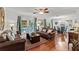 Open living room with dining area, featuring a large window overlooking the pool at 2312 S Summerlin Ave, Orlando, FL 32806