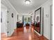 Bright living room featuring hardwood floors, French doors, and comfortable seating at 2312 S Summerlin Ave, Orlando, FL 32806