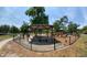 Outdoor park featuring a playground, picnic tables, and a shaded pavilion for community enjoyment at 2312 S Summerlin Ave, Orlando, FL 32806