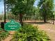 View of the Wadeview Park sign surrounded by greenery, offering a welcoming entrance to the park grounds at 2312 S Summerlin Ave, Orlando, FL 32806