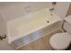 Bathroom featuring tile flooring and a shower-tub combination at 236 Afton Sq # 207, Altamonte Springs, FL 32714