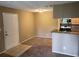 Inviting living area featuring neutral paint, plush carpeting, and an open layout to the kitchen at 236 Afton Sq # 207, Altamonte Springs, FL 32714