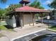 Community mailboxes and a covered structure for residents with green spaces and trees surrounding the residential area at 236 Afton Sq # 207, Altamonte Springs, FL 32714