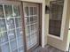 Outdoor patio area accessible through sliding glass doors and an additional window at 236 Afton Sq # 207, Altamonte Springs, FL 32714