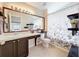 Bathroom featuring a large mirror and decorative accents at 2489 Tommys Turn, Oviedo, FL 32766