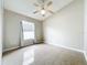 Bright bedroom with a ceiling fan and neutral paint at 2489 Tommys Turn, Oviedo, FL 32766