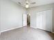 Spacious bedroom with a ceiling fan and closet at 2489 Tommys Turn, Oviedo, FL 32766