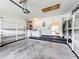 This garage has a washer and dryer, garage door, shelving, and access to the home at 2489 Tommys Turn, Oviedo, FL 32766