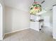 Open floor plan showcases the kitchen with a decorative light fixture above the dining area at 2489 Tommys Turn, Oviedo, FL 32766