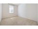 Neutral bedroom with large window that allows for plenty of natural light at 2782 Cedar Knoll Dr, Apopka, FL 32712