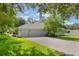 Charming single-story home with a three-car garage and a well-manicured lawn at 2782 Cedar Knoll Dr, Apopka, FL 32712