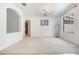 Bright living room with neutral carpet and a large window providing ample natural light at 2782 Cedar Knoll Dr, Apopka, FL 32712