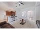 Open living space featuring kitchen with bar seating, and sofa at 2782 Cedar Knoll Dr, Apopka, FL 32712