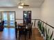 Inviting dining room featuring a wooden table, chair set and a view to the outdoor space at 3021 Norvell Ct, Deltona, FL 32738