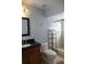 Bathroom has a single sink, vanity, toilet and a shower at 3024 S Semoran Blvd # 7, Orlando, FL 32822