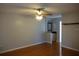 The spacious living room has hardwood floors and natural light at 3024 S Semoran Blvd # 7, Orlando, FL 32822