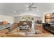 Expansive living space with multiple sofas, dining table and TV at 3426 Cocard Ct, Windermere, FL 34786