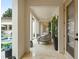 Inviting covered patio with comfortable seating and views of the pool at 3426 Cocard Ct, Windermere, FL 34786