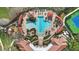 Aerial view of a resort-style community pool featuring a wading area, lap lanes, and shaded lounge spaces at 3508 Porta Romano Way, Lake Mary, FL 32746