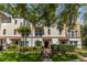 Charming multi-level townhome with well-maintained landscaping and a welcoming front entrance at 3508 Porta Romano Way, Lake Mary, FL 32746