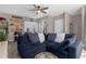 Comfortable living room area with ceiling fan, recessed lighting, and large sectional sofa at 3508 Porta Romano Way, Lake Mary, FL 32746
