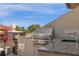 Outdoor kitchen with stainless steel grill, sink, and mini refrigerator, perfect for entertaining at 3508 Porta Romano Way, Lake Mary, FL 32746