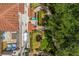 Aerial view of a backyard patio space, complete with plush seating and manicured garden at 3508 Porta Romano Way, Lake Mary, FL 32746
