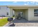 Backyard with patio, grill, and a view of the adjacent lot at 3936 Silverstream Ter, Sanford, FL 32771