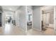 Hallway featuring views of a bedroom and bathroom at 3936 Silverstream Ter, Sanford, FL 32771