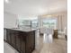 Beautiful kitchen with granite countertops, stainless steel appliances, and a large dining area at 3936 Silverstream Ter, Sanford, FL 32771