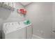 Practical laundry room with appliances and storage at 3936 Silverstream Ter, Sanford, FL 32771