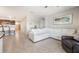 Open-concept living room connected to the kitchen with modern furnishings at 3936 Silverstream Ter, Sanford, FL 32771