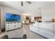 Open-concept living room and kitchen with dining area at 3936 Silverstream Ter, Sanford, FL 32771