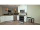 Bright kitchen featuring stainless steel appliances, and a breakfast bar, great for gatherings at 4858 Magnetite Loop, Mount Dora, FL 32757