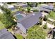 An aerial view showcases the home's pool, backyard, roof, and surrounding neighborhood at 503 Savona Ct, Altamonte Springs, FL 32701